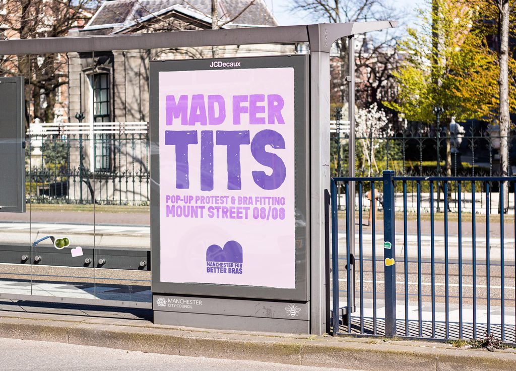 Student work by Emma Watts bus stop poster mockup which reads MAD FER TITS