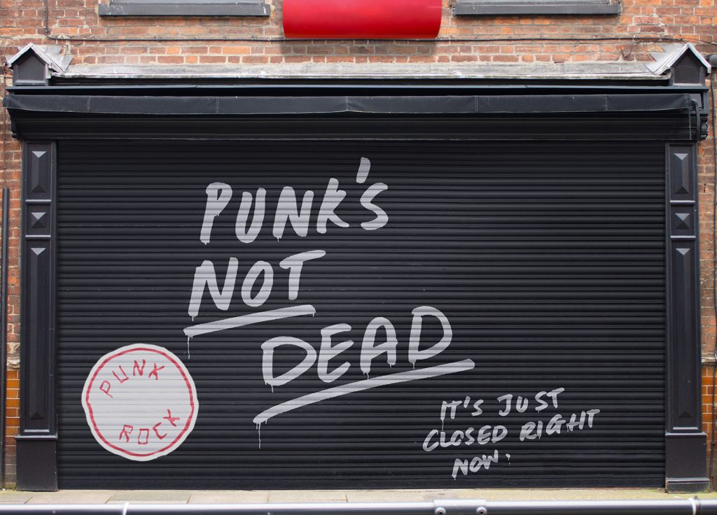 Student work by Emma Watts shows a concept for a shop's roller shutter, with handwritten text that reads: punks not dead it's just closed