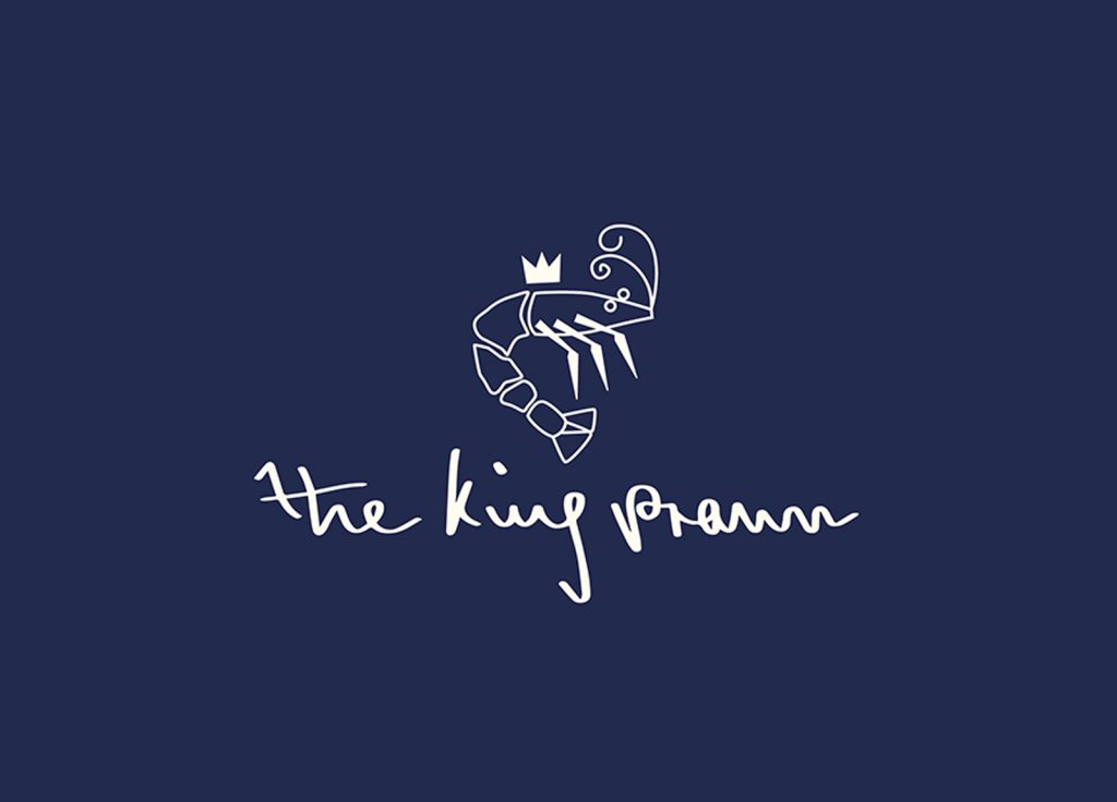 Student work by Olivia Knights concept for a fishmonger logo with script that reads The King Prawn and a logo above of an illustrated prawn with a crown