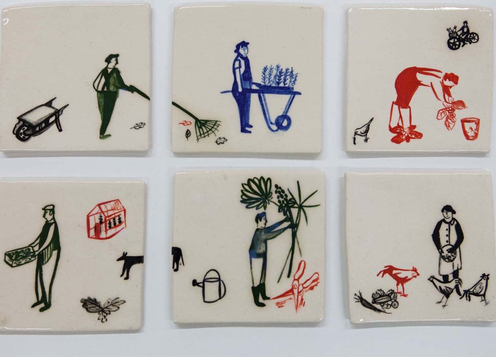 Image of ceramic tiles featuring drawings of characters