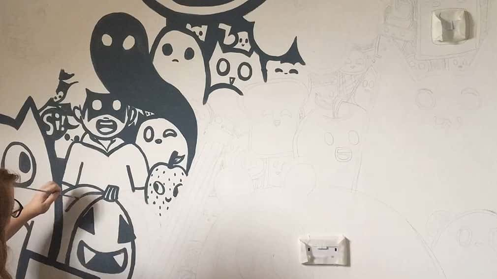 An in progress shot of a spooky themed mural