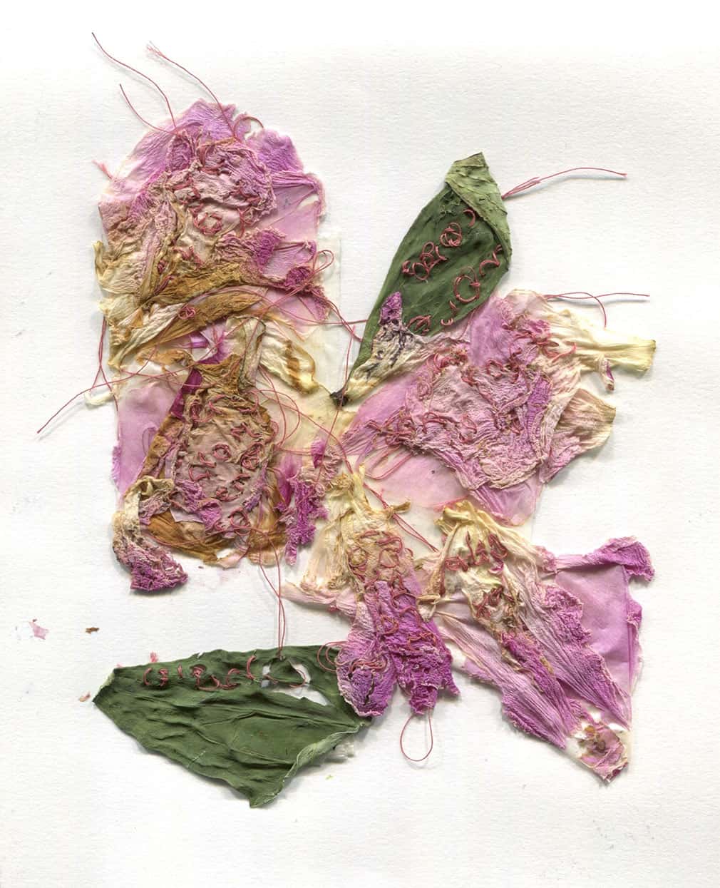 fabric stitched and arranged to look like dry flowers