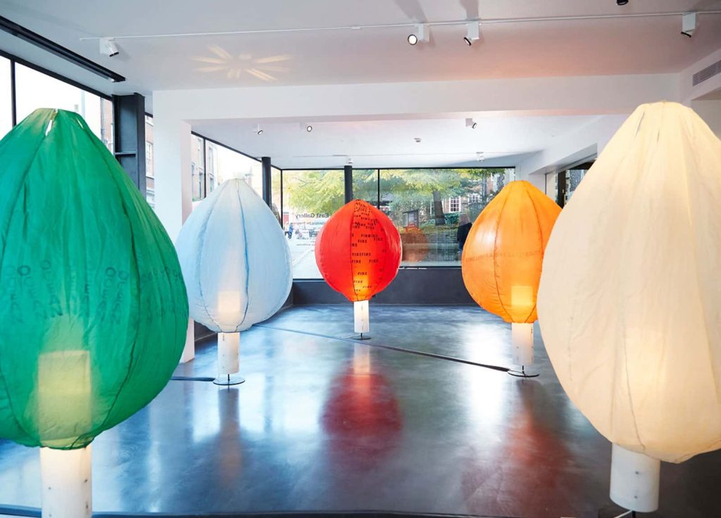 Image of inflated ballons with lights inside them on display in a gallery space