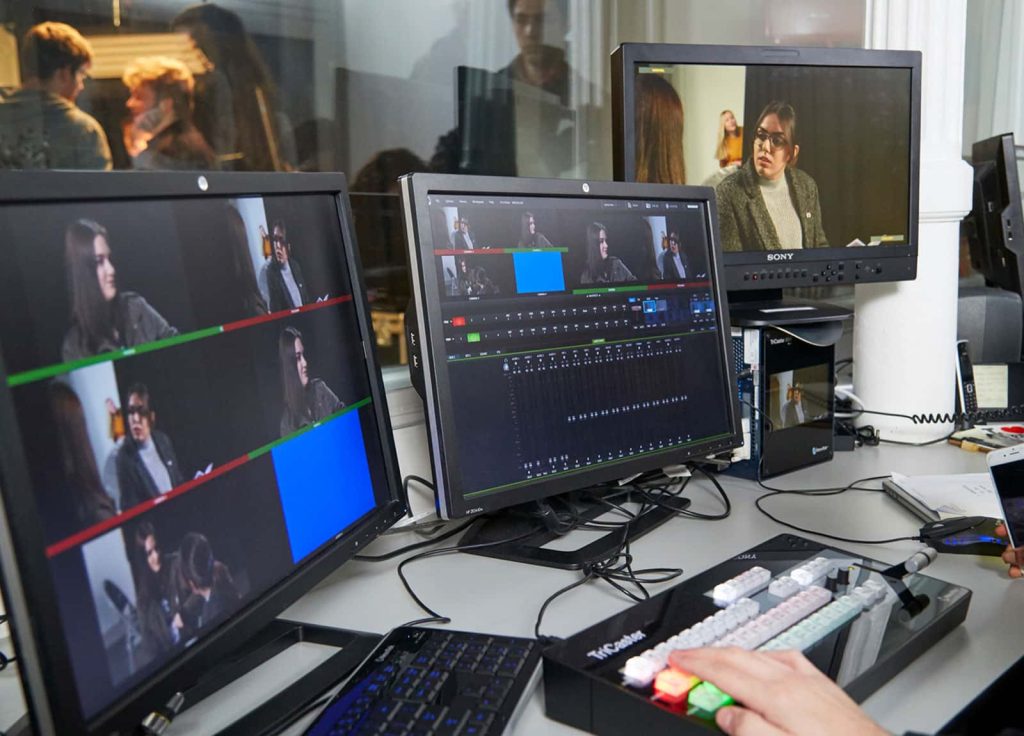 Image of computer and editing decks in a film studio