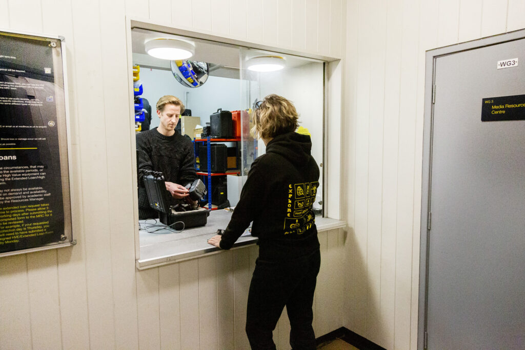 Media Resource Centre - person taking out equipment