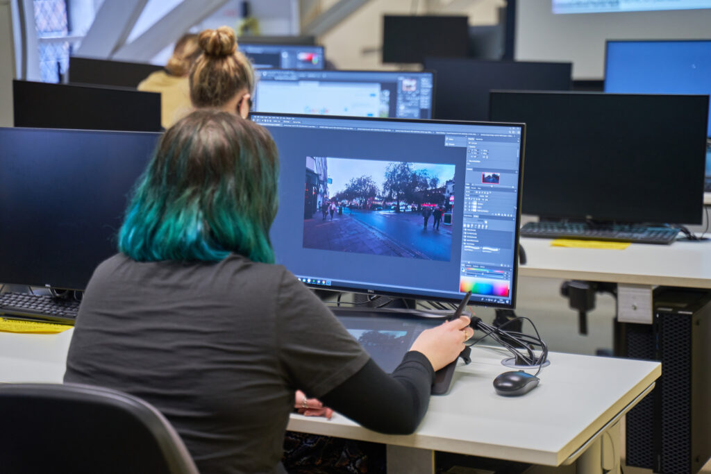 Students using media labs on campus