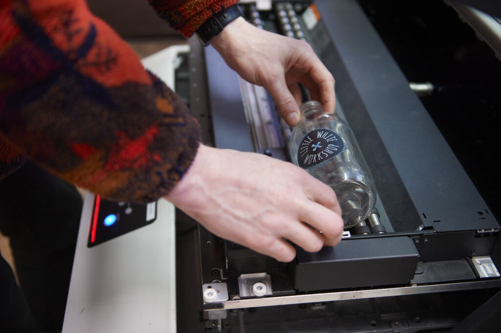 Students and staff using UV printer