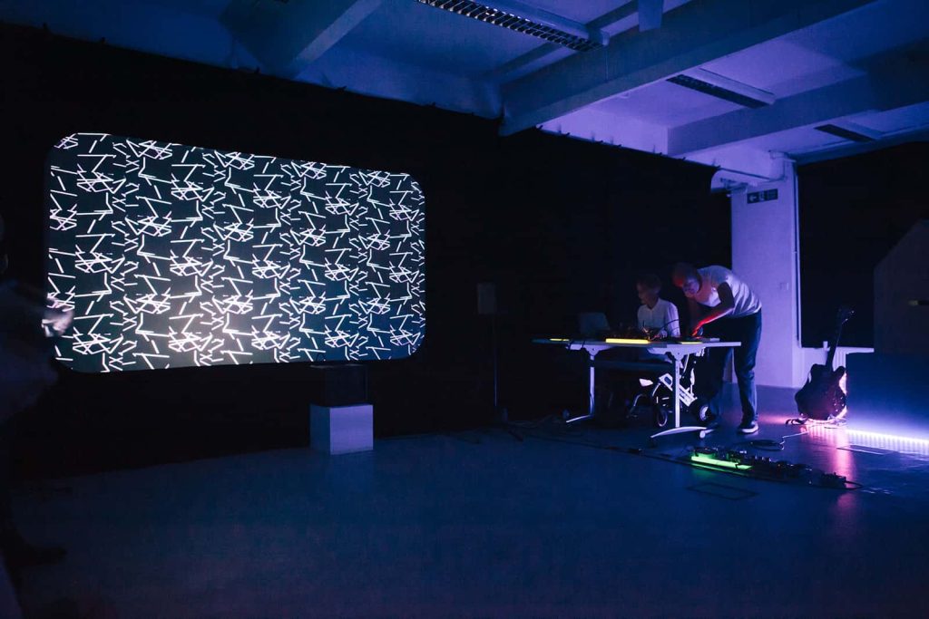 MA Degree Show live performance by Moving Image and Sound students with screen and DJ booth