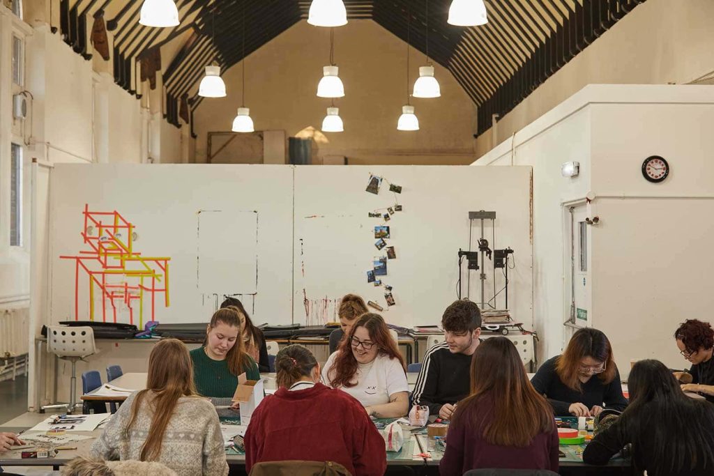 Year 0 students at Norwich University of the Arts work in their studio space