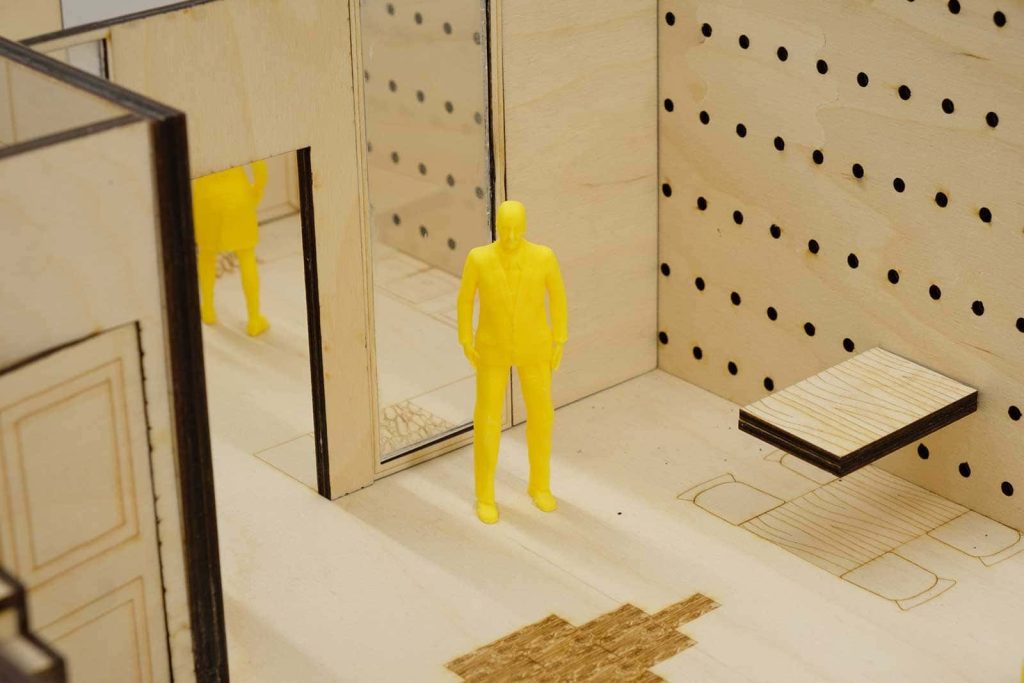 Yellow model of a person in an Interior Design model by Norwich University of the Arts Interior Design student