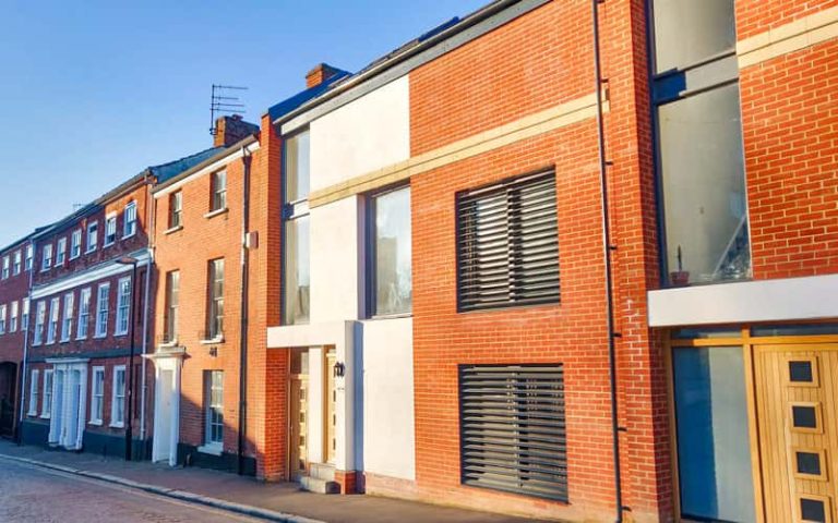 My Student Home: outside Twins Ethan and Molly Brown's modern terraced home in the city centre. The house has a modern, sleek exterior with large windows