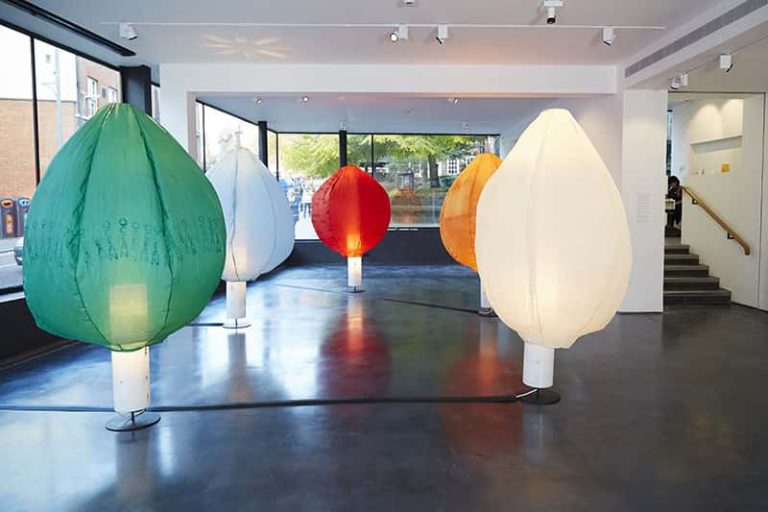 Large paper lanterns placed in gallery