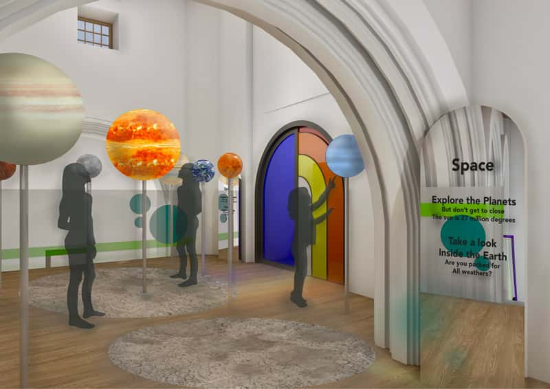 Digital render of a church interior converted into an interactive science museum. Shadow figures are shown amongst a solar system display, interacting with the planets. By BA Interior Design student Daisy Parkes