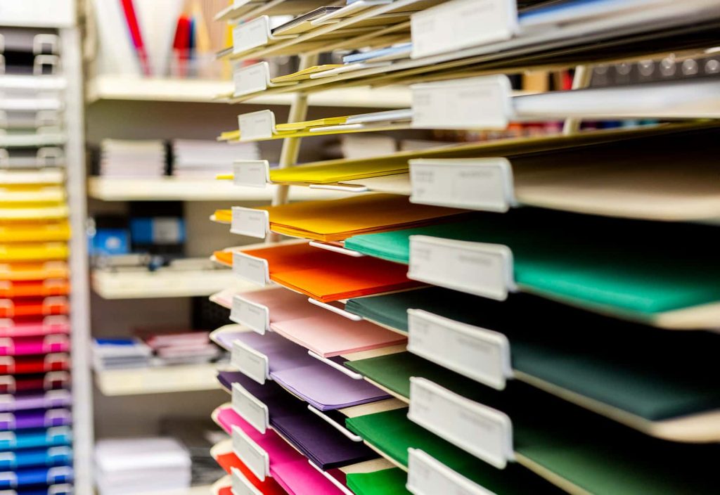 Colourful shelves of paper and card at the shop