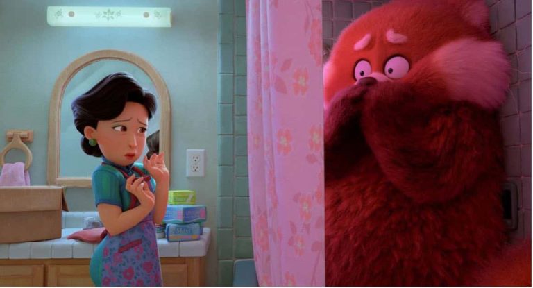 Turning Red animated film. Mei's mother finds her transformed into a red panda in her bathroom.