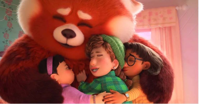 Turning Red screen shot: the group of friends share a hug with Mei, who has transformed into a red panda