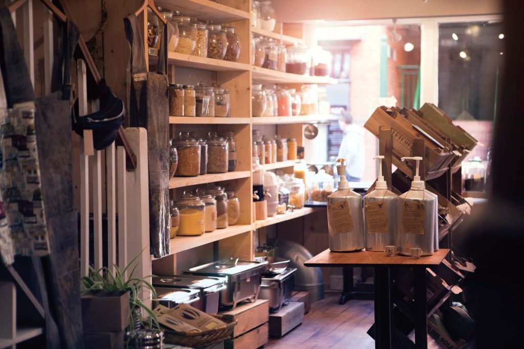 Re.source general reuse store in Norwich, Norfolk showing shelves full of various home items