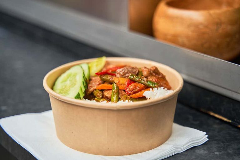 Image showing bowl of food from market stall with vegetables, rice and meats