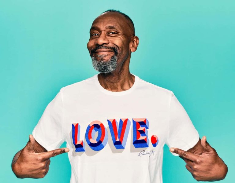 A photo of Lenny Henry wearing a white t-shirt with the word 'love' on it for Comic Relief's 2022 Red Nose Day.