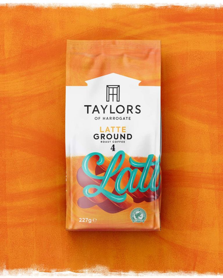 A photo of Taylors and Harrogate coffee packaging. The packaging is orange with blue typography.