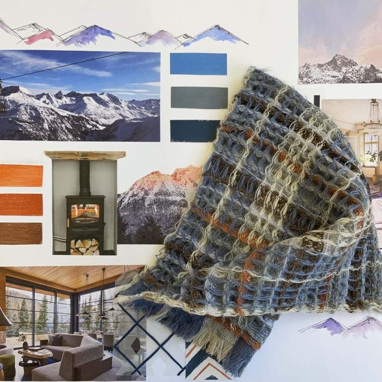 A textile sample of a heavy blue, brown and white weave. Behind are several concept images of mountains and alpine lodges, and some colour swatches.