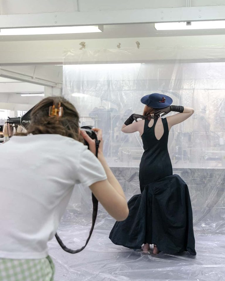 A photo of 'behind the scenes' of a fashion photoshoot where 3rd year BA (Hons) Fashion students are showcasing their end of year outfits ready for Graduate Fashion Week.