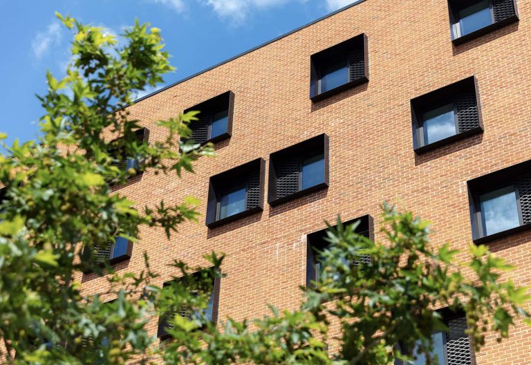 A photo of Duke Street Riverside windows on a summers day.