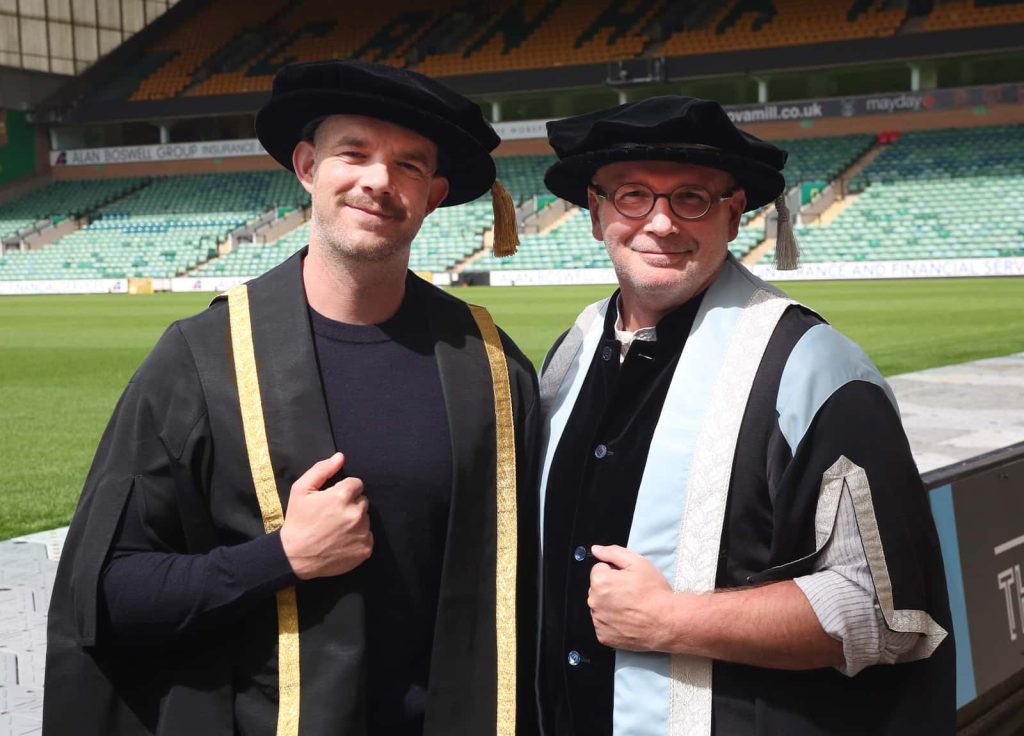 Russell Tovey with Professor Simon Ofield-Kerr at a Norwich University of the Arts graduation ceremony