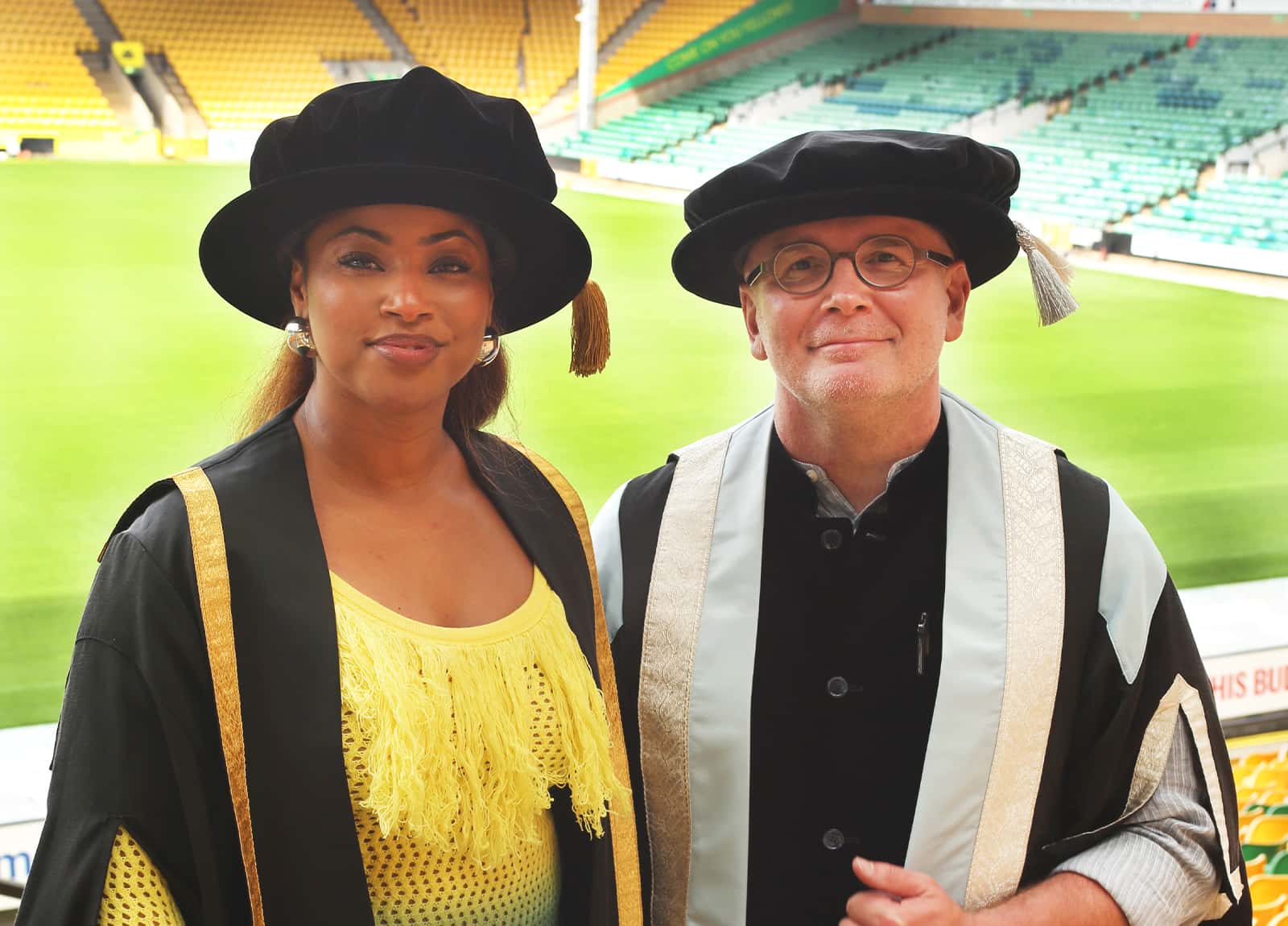 Jay-Ann Lopez with Professor Simon Ofield-Kerr at a Norwich University of the Arts graduation ceremony