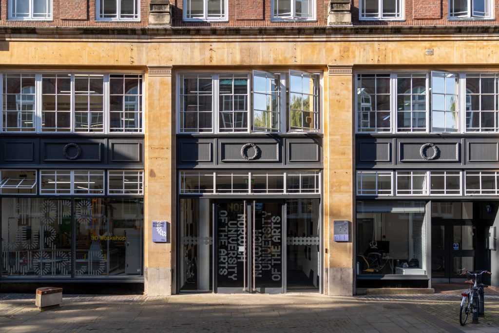 A photo of the front entrance to Guntons Building on a sunny morning.