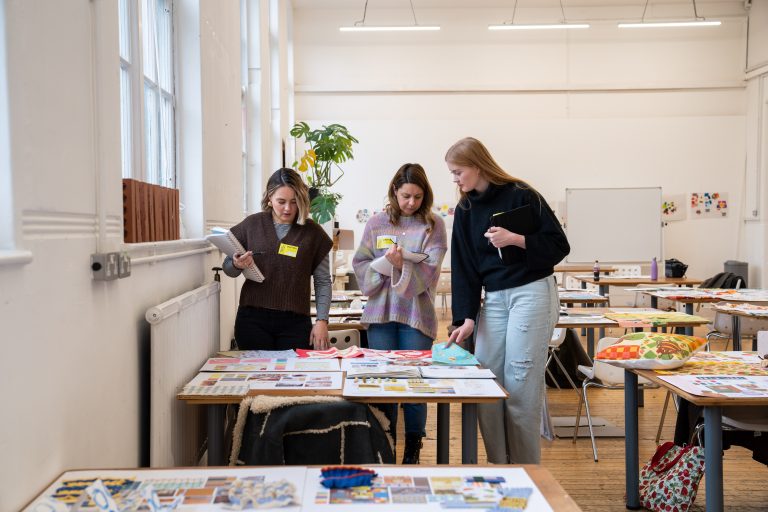 Habitat designers Tasha Warren, Charlotte Robinson and Louise Rynehart assessing students work.