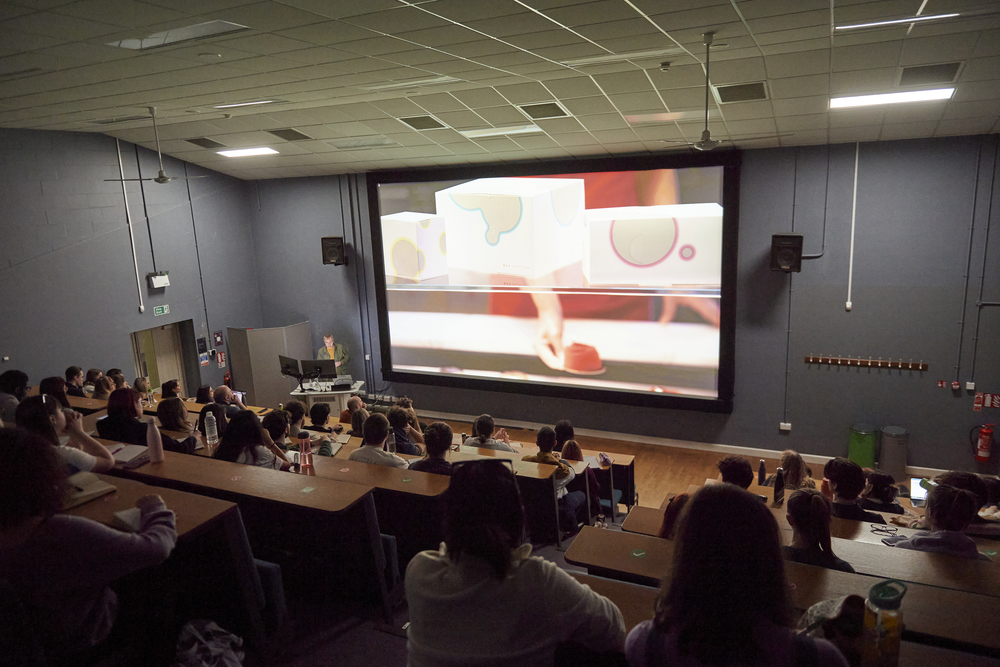 Duke Street Lecture Theatre with students seated and a presentation on screen.