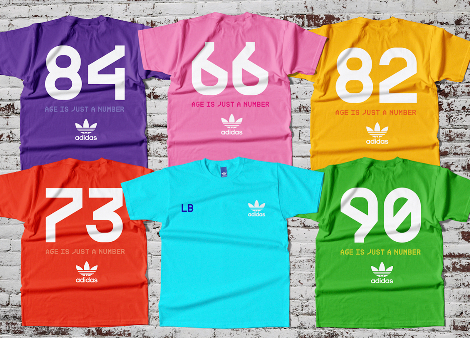 Student work by Lois Brandon, Colourful t-shirts layed out with bright white numbers on the back