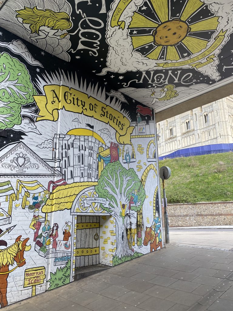 A photo near Norwich castle of a wall and ceiling painted