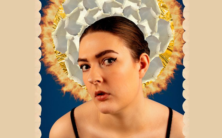 Work by photography student Claudy Woods. Claudy looks at the camera with head turned slightly to one side. There is a grey circular shape behind her head, on a blue background.