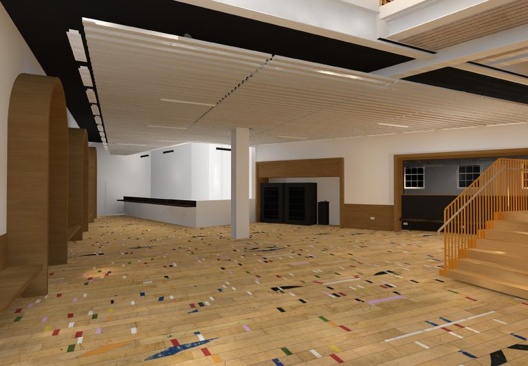 Interior of a modern, empty room with a unique geometric wooden floor pattern. It features a long counter, arched doorways on the left, a white column in the center, and an orange staircase leading to an upper level on the right.