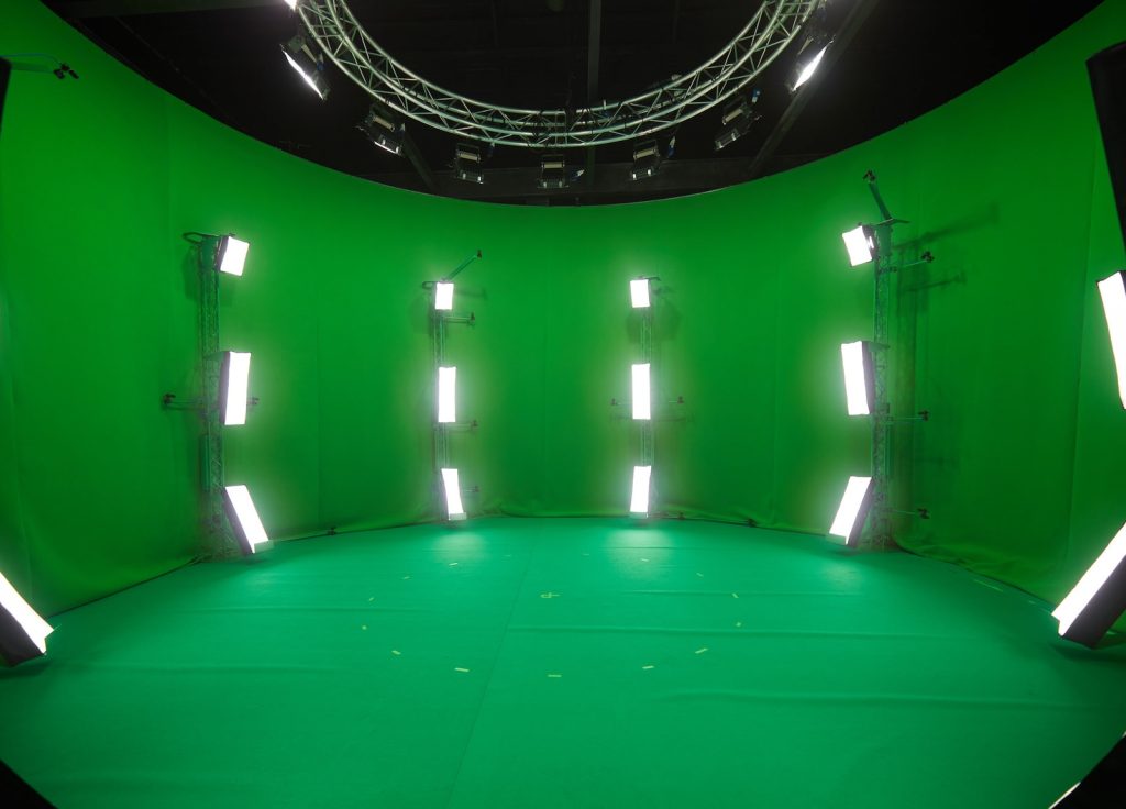 4D Holysys volumetric capture system, showing a circular green screen with rigged lighting inside it.