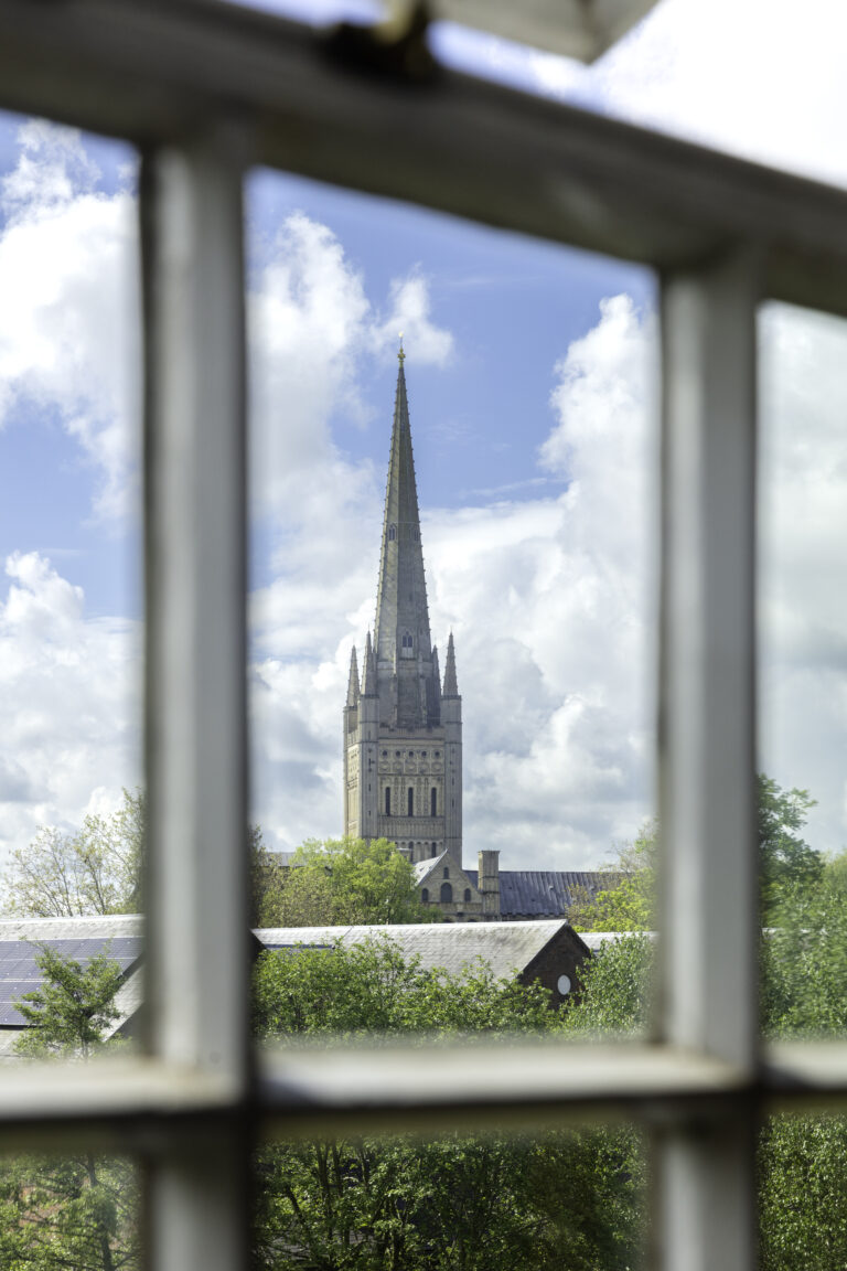 Norwich cathedral through a window