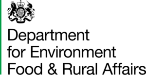 A single thin green vertical line, reminiscent of young shoots in paludiculture, stands on the left edge of a black background. The rest of the image is completely black.