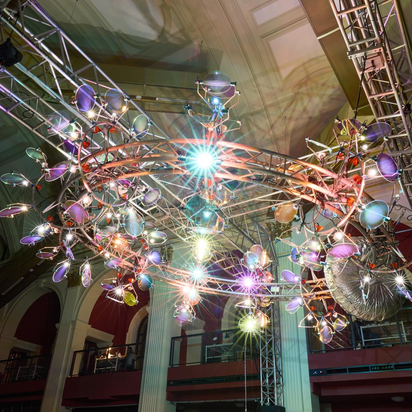 An image relating to Mechanism makes its home at Norwich University 🎉 

Suspended in the heart of our Bank Plain building, Mechanism - by acclaimed artist @andrew_kearney_artist - is a kinetic light installation that turns Norwich’s city sounds into a daily light sequence