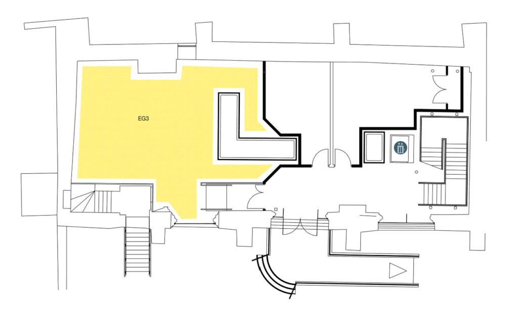 A floor plan with a large yellow-highlighted room labeled "EG3" on the left, surrounded by hallways, doors, stairs, and a room with a toilet symbol on the right.