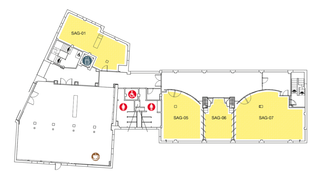 Floor plan showing three yellow-highlighted rooms labeled SAG-05, SAG-06, and SAG-07, an additional room labeled SAG-01, restrooms, accessibility icons, stairs, and an elevator.