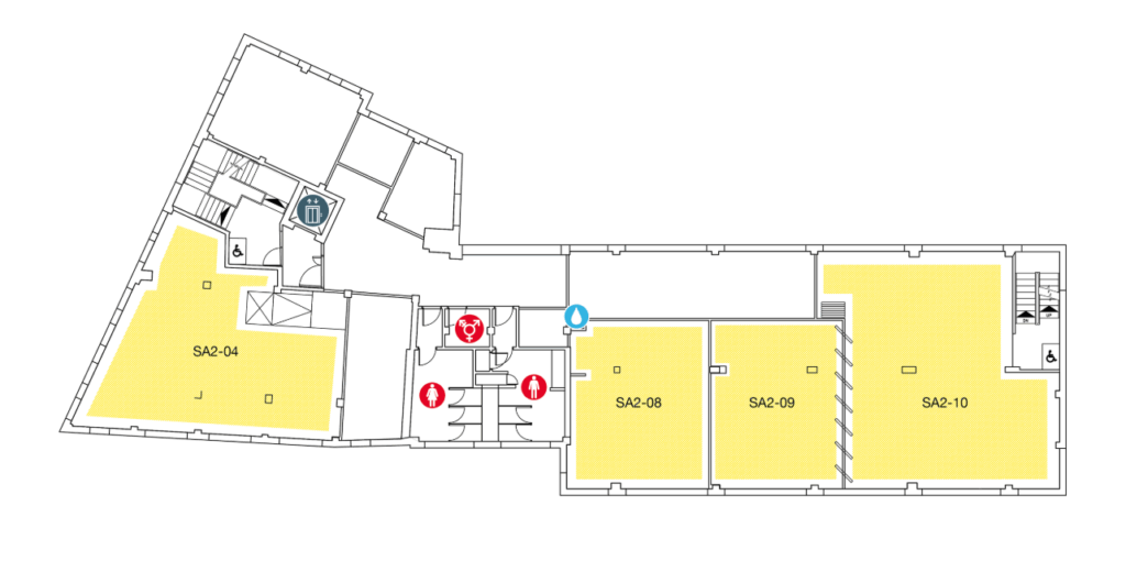 Floor plan with four large yellow rooms labeled SA2-04, SA2-08, SA2-09, and SA2-10; icons indicate restrooms, elevators, and stairs along the central corridor.