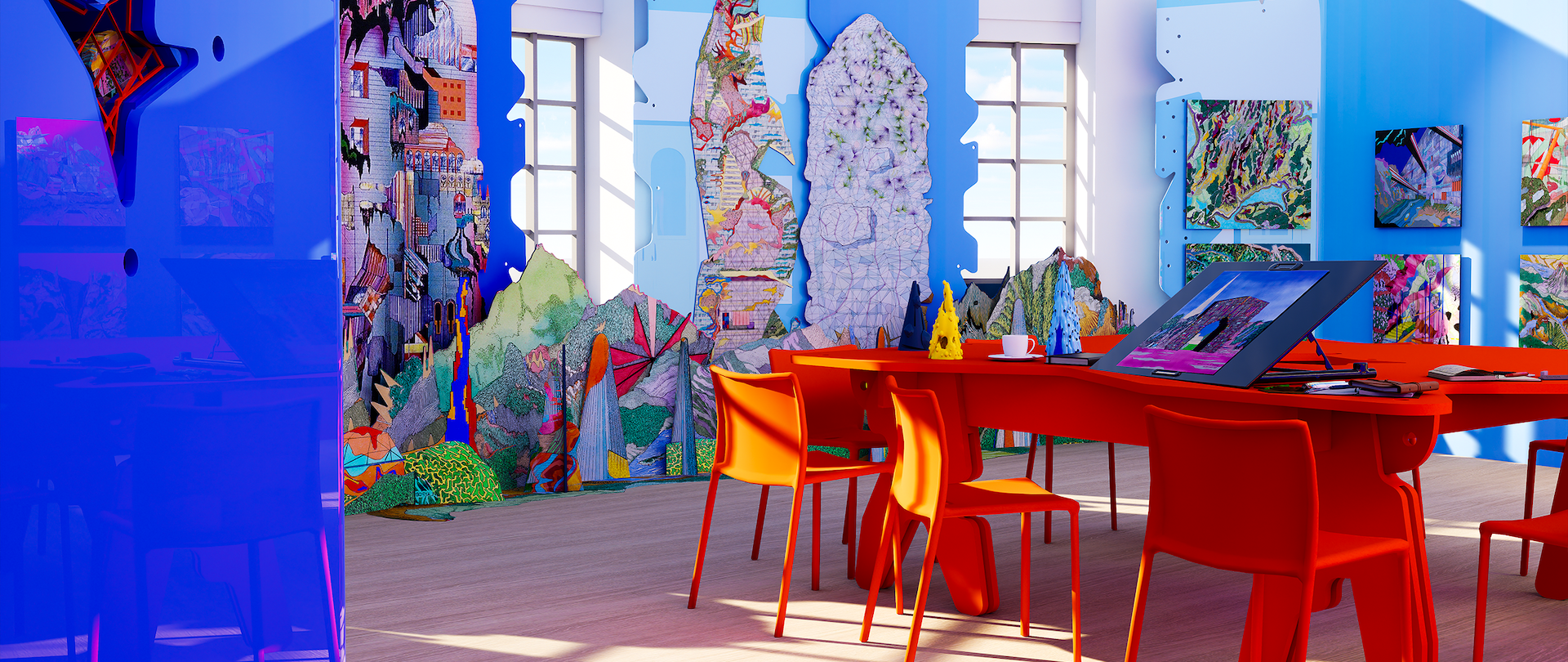 A brightly lit art studio with red tables and chairs, colorful abstract art on blue partition walls, and large windows letting in natural light. Art supplies and a digital tablet are on the table.