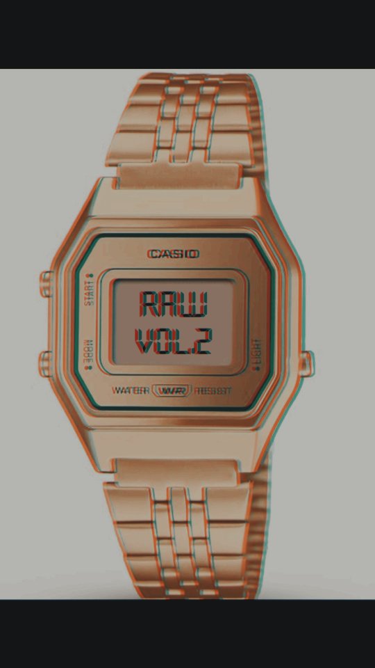 A gold Casio digital wristwatch displays the text "RAW VOL.2" on its screen, with a slight red and blue 3D effect on the image. The background is plain and light-colored.