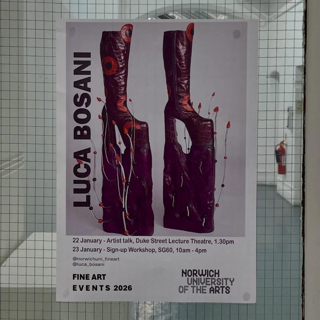 Poster on a glass door featuring two tall, sculptural, purple boots with orange and white designs. It advertises LUCA BOSANI events at Norwich University of the Arts for Fine Art Events 2026.