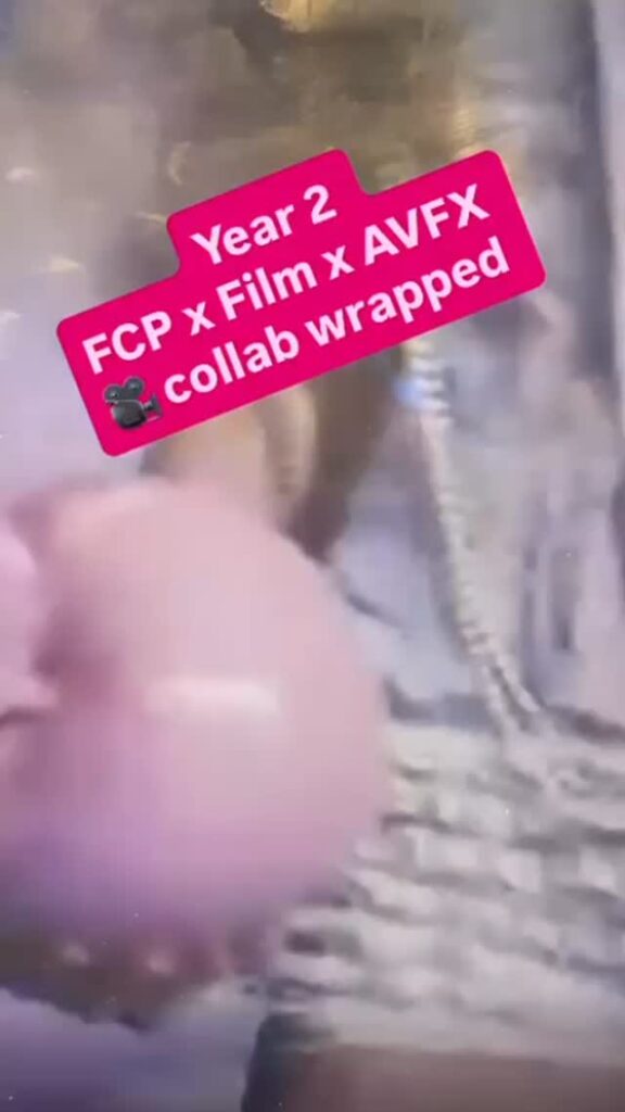 A close-up image shows a person holding a pale pink balloon. Text over the image reads, "Year 2 FCP x Film x AVFX 🎥 collab wrapped." The person is wearing a beaded necklace and a textured, light-colored outfit.