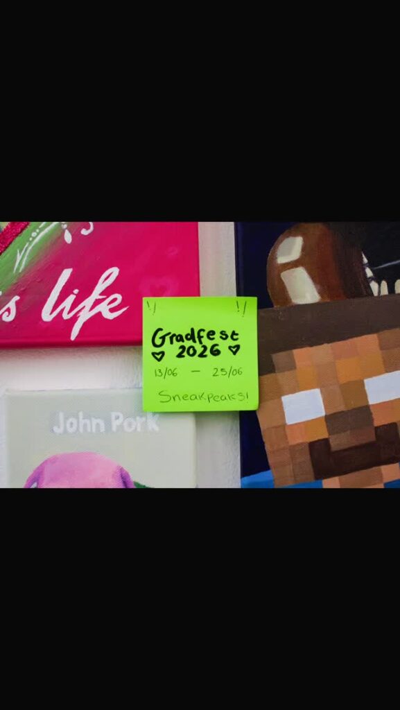 A neon green sticky note reads “Gradfest 2026, 13/06 – 25/06, Sneakpeaks!” on a wall surrounded by colorful artwork, including a Minecraft-style face and a painting labeled “John Pork.”.