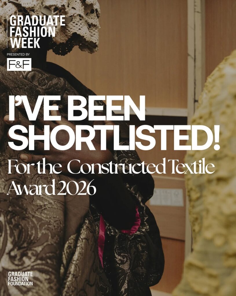 A person in an elaborate, textured outfit stands indoors. Large white text reads: "I'VE BEEN SHORTLISTED! For the Constructed Textile Award 2026" with Graduate Fashion Week branding.
