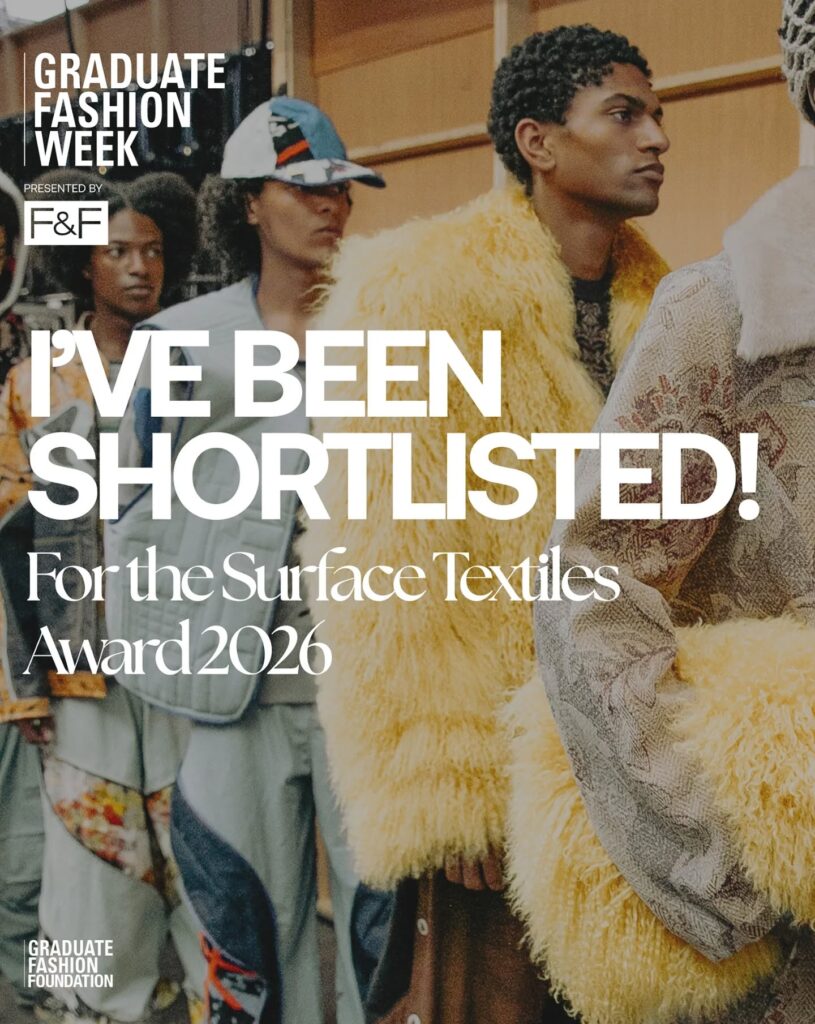 Models wearing creative, textured outfits line up backstage at a fashion show. Bold white text reads, "I’VE BEEN SHORTLISTED! For the Surface Textiles Award 2026" with Graduate Fashion Week branding.